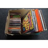 A box of 12 inch vinyl albums and 7 inch singles - compilations etc