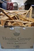 Three boxes of wooden coat hangers