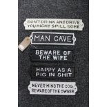 Five cast iron signs - Beware of the wife,