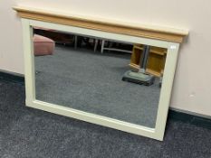 A contemporary oak painted overmantel mirror