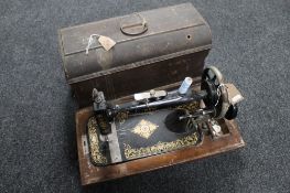 A cased 20th century New Home Companion sewing machine