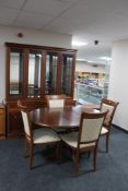 A contemporary G-plan seven piece dining room suite comprising of four drawer cabinet,