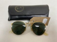 A pair of gent's Rayban sunglasses in case