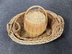 Two early 20th century wicker baskets and lidded hand basket