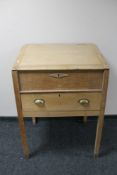 An antique pine clerks desk fitted with a drawer