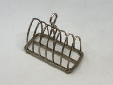 An antique silver seven bar toast rack CONDITION REPORT: 231.8g.