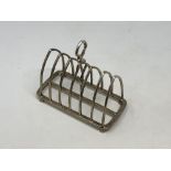 An antique silver seven bar toast rack CONDITION REPORT: 231.8g.