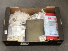 A box of various stamps and cigarette cards (Qty)