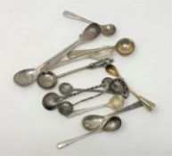 Twelve various silver salt spoons and a William IV silver gilt medicine spoon (13)