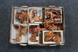 A box of wooden articulated toys