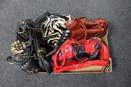 A box of lady's leather hand bags