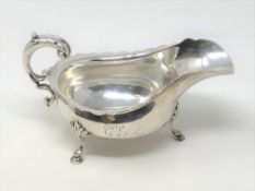 A silver sauce boat on three hoof feet, London marks CONDITION REPORT: 246.6g.