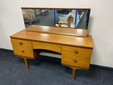 A mid century teak G-plan dressing table