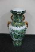 A large 20th century Japanese vase with gilded handles depicting figures