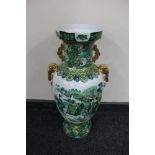 A large 20th century Japanese vase with gilded handles depicting figures