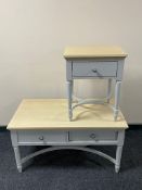 A contemporary pine topped coffee table on painted base together with matching side table