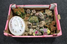 A box of assorted cottage ornaments, china flower posies,