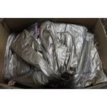 A box of Phaze Barbarella style cat suits