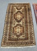 An Afghan village rug on cream ground,