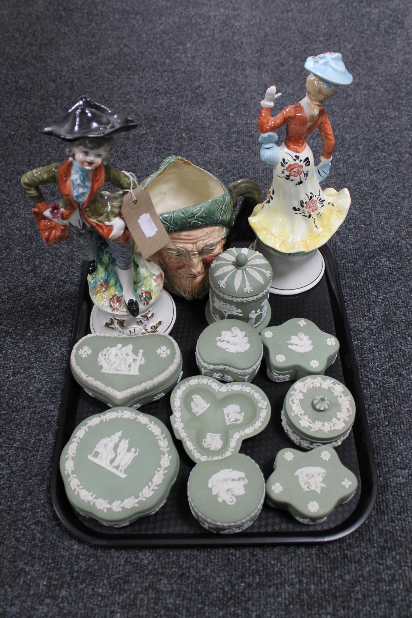 A tray of nine pieces of green and white Jasperware, two Capodimonte figures,