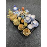 A tray of two continental pottery tea services,