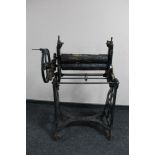 An antique cast iron mangle (a/f)