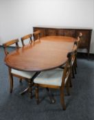 An eight piece Regency style inlaid mahogany dining room suite - sideboard,