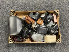 A box of vintage cameras Olympus, Canon,