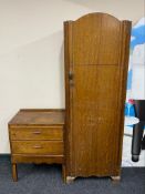 A mid 20th century sentry door wardrobe together with matching two drawer chest