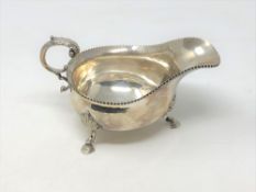 A large silver sauce boat on hoof feet, Birmingham marks CONDITION REPORT: 277g.