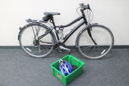 A Lady's Globe Hybrid bike together with a box of accessories