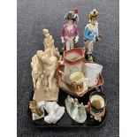 A tray of two china Napoleonic style figurines, resin figure of a soldier, two Nao ducks,