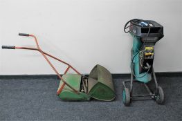 A Bosch electric garden chipper shredder together with a vintage Qualcast super Panther push mower