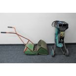 A Bosch electric garden chipper shredder together with a vintage Qualcast super Panther push mower