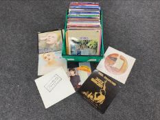 A box of vinyl Lp's and 12 inch singles including David Bowie, Bob Dylan, Mick Jagger,