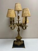 A good quality early 20th century brass five way table candelabrum on marble base