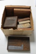A box of copper mounted wooden printing blocks