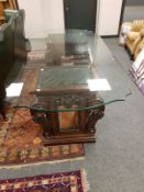 An Empire style pedestal glass topped dining table,