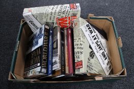 A box of Images of War magazines in folders,