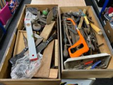 Two oak drawers containing hand tools, cobbler's last, spirit level,