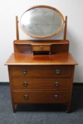 An Edwardian mahogany dressing chest