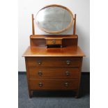 An Edwardian mahogany dressing chest