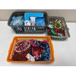 Three basket of costume jewellery, beaded necklaces,