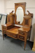 An Edwardian inlaid mahogany dressing table,