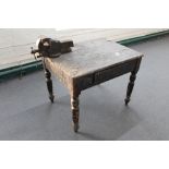 An antique pine kitchen table fitted with a drawer with heavy duty bench vice (a/f)