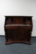 An Eastern mahogany Victorian style bureau