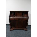 An Eastern mahogany Victorian style bureau