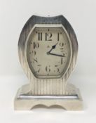 A good quality Art Deco silver cased 8 day mantel clock,