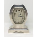 A good quality Art Deco silver cased 8 day mantel clock,