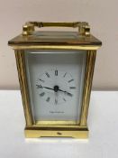 A brass cased Mappin and Webb carriage clock with key